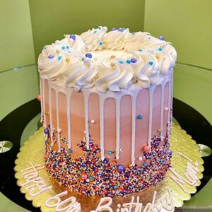 Pinkie birthday drip cake with colourful beads