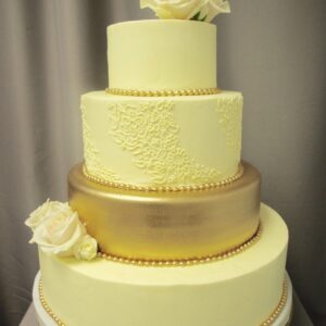 Four-tier golden deluxe wedding cake